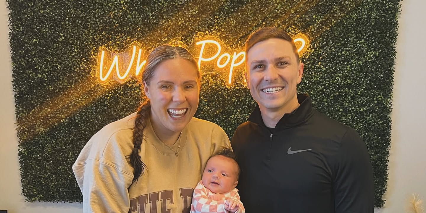 Dr. Cody Muren with a new mom and her baby at Full Swing Healthcare